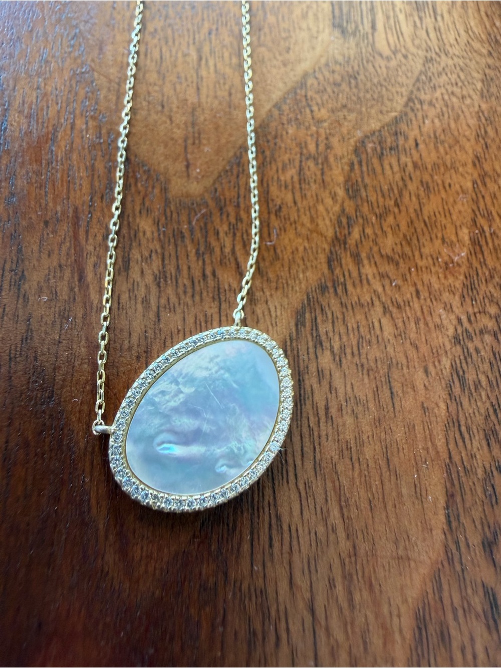 Gold Oval Mother-of-Pearl Pendant Necklace with Crystal Halo